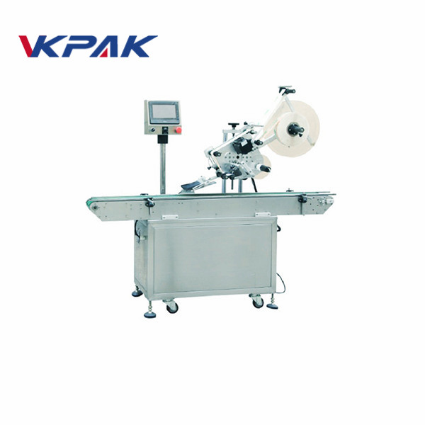 Makinë vetë etiketuese ngjitëse për anën e sipërme të tullave me akull